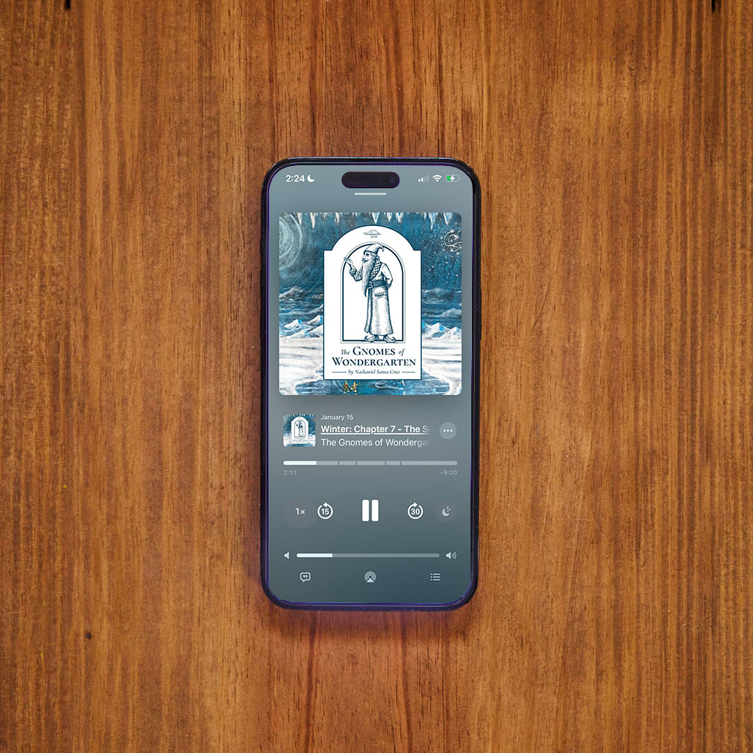 Phone displaying Apple Podcast The Gnomes of Wondergarten on wooden table